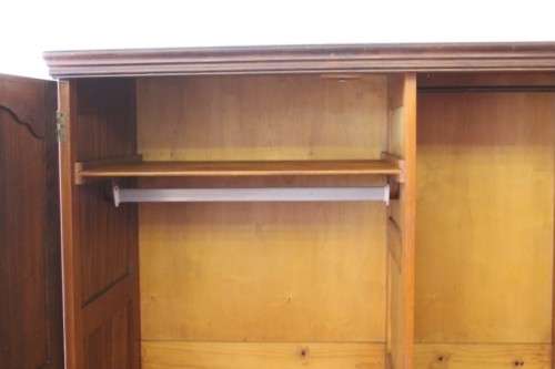 An awesome vintage solid Imbuia 2-door wardrobe with ample hanging space and packing space