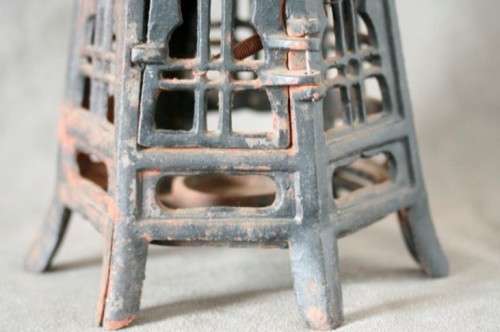 An amazing vintage Chinese cast iron candle lantern with lovely detailing.