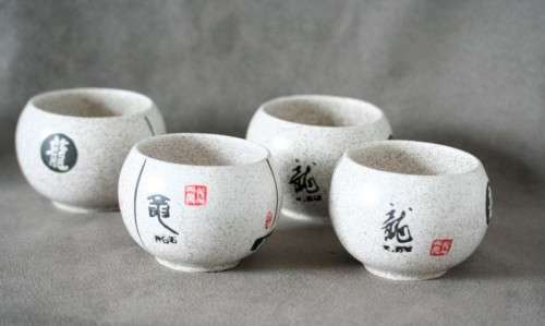 A lovely set of four decorative Chinese ceramic tea cups.