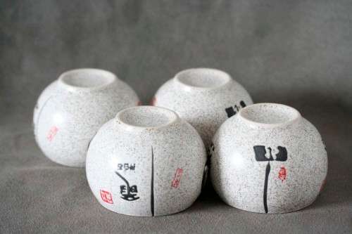 A lovely set of four decorative Chinese ceramic tea cups.