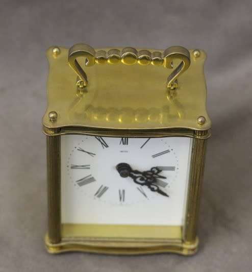 A beautiful vintage "Smiths" brass battery operated carriage clock, working.