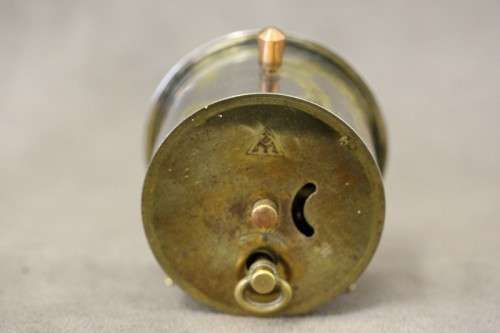 A gorgeous vintage mini round silver metal wind up clock, working.
