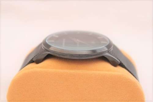 A stylish black Buren all stainless steel men's watch with an adjustable black mesh strap