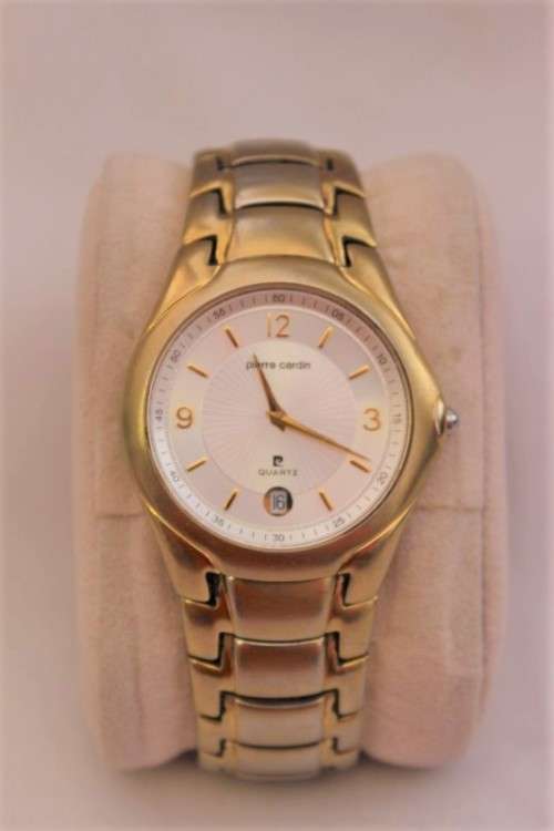 A wonderful vintage white-face Pierre Cardin gold plated gents quartz wrist watch with a date window