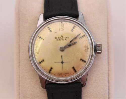 An awesome vintage Swiss made Delfin Edox ladies stainless steel watch with a black leather strap