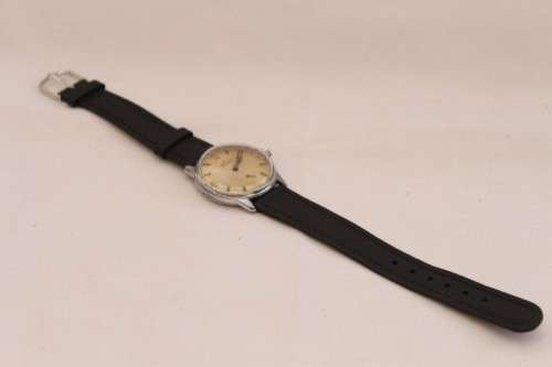 An awesome vintage Swiss made Delfin Edox ladies stainless steel watch with a black leather strap