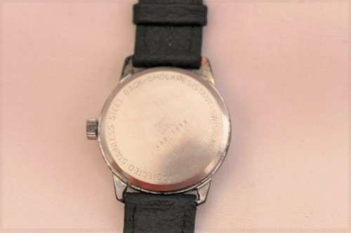 An awesome vintage Swiss made Delfin Edox ladies stainless steel watch with a black leather strap