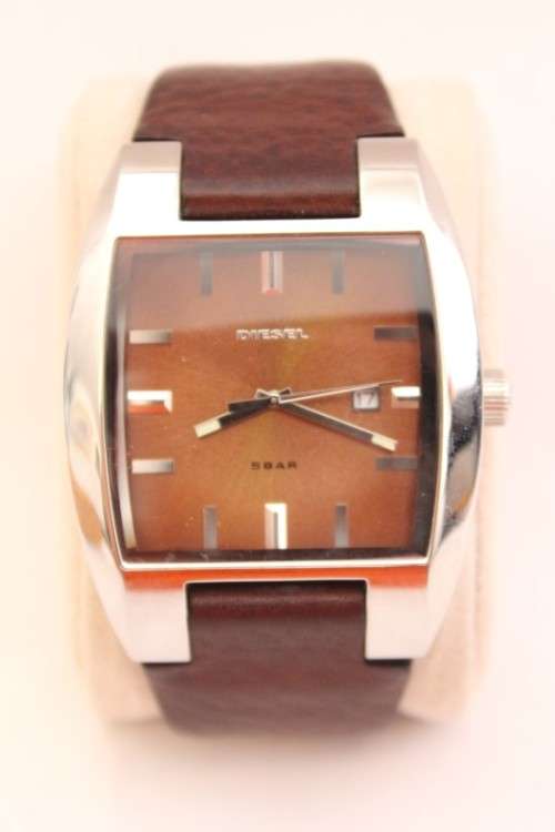 A stunning modern Diesel "Only the Brave" gents stainless steel watch with a brown leather strap