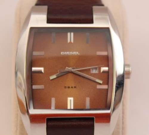 A stunning modern Diesel "Only the Brave" gents stainless steel watch with a brown leather strap