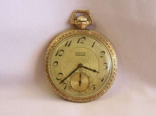 An exquisite antique (c1932) 14ct gold filled ornate Elgin pocket watch with an inscription