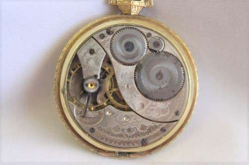 An exquisite antique (c1932) 14ct gold filled ornate Elgin pocket watch with an inscription