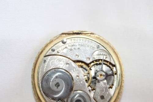 An exquisite antique (c1932) 14ct gold filled ornate Elgin pocket watch with an inscription