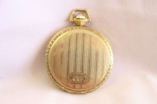An exquisite antique (c1932) 14ct gold filled ornate Elgin pocket watch with an inscription