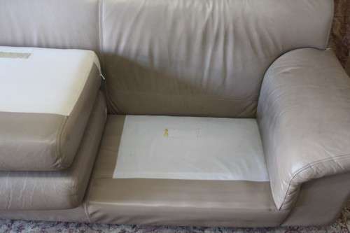 A lovely well made (206cm long) 2 seater beige faux leather couch. Perfect in informal rooms