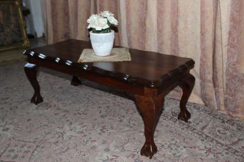 A lovely vintage scalloped edge solid Imbuia wood ball and claw coffee/ side table