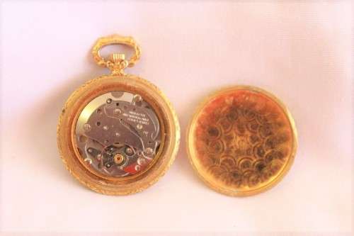 A stunning ornate vintage gold plated 7-Jewel Swiss made Oris ladies pocket watch