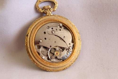 A stunning ornate vintage gold plated 7-Jewel Swiss made Oris ladies pocket watch