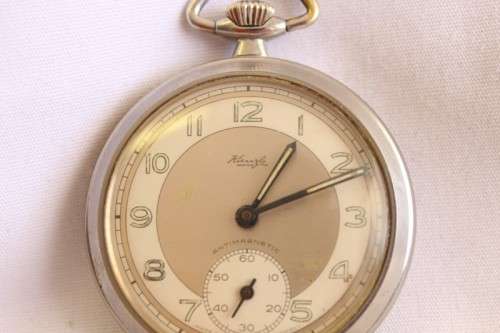 A lovely vintage German made silver plated Kienzle Antimagnetic open face pocket watch