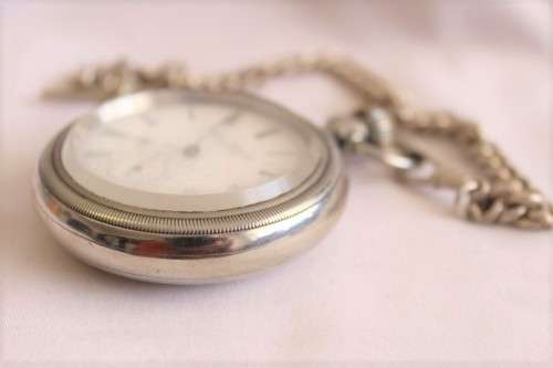 An awesome Swiss made silver plated 7-Jewel enamel face Nirvana pocket watch and fob chain