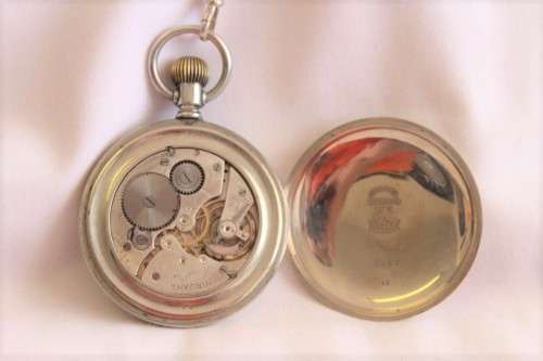 An awesome Swiss made silver plated 7-Jewel enamel face Nirvana pocket watch and fob chain