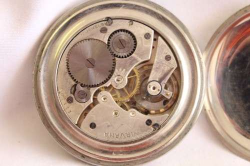 An awesome Swiss made silver plated 7-Jewel enamel face Nirvana pocket watch and fob chain