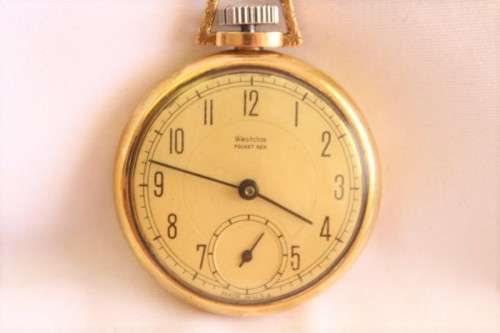 An awesome USA made Westclox Pocket Ben gold plated open-face pocket watch with a fob chain