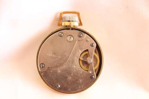 An awesome USA made Westclox Pocket Ben gold plated open-face pocket watch with a fob chain