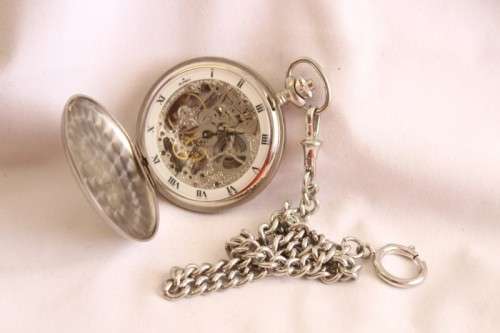A stunning modern brushed steel Buren "skeleton" full hunter pocket watch with a fob chain