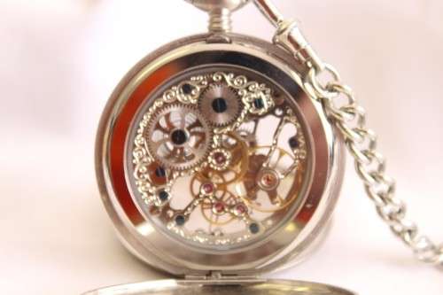 A stunning modern brushed steel Buren "skeleton" full hunter pocket watch with a fob chain