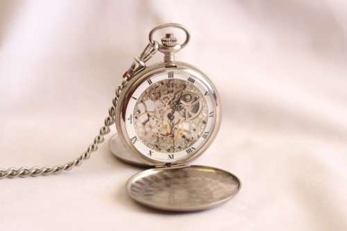 A stunning modern brushed steel Buren "skeleton" full hunter pocket watch with a fob chain