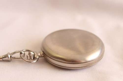 A stunning modern brushed steel Buren "skeleton" full hunter pocket watch with a fob chain