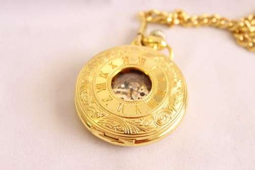 A stunning gold plated German made Kronen & Sohne pocket watch with a fob chain in its original box
