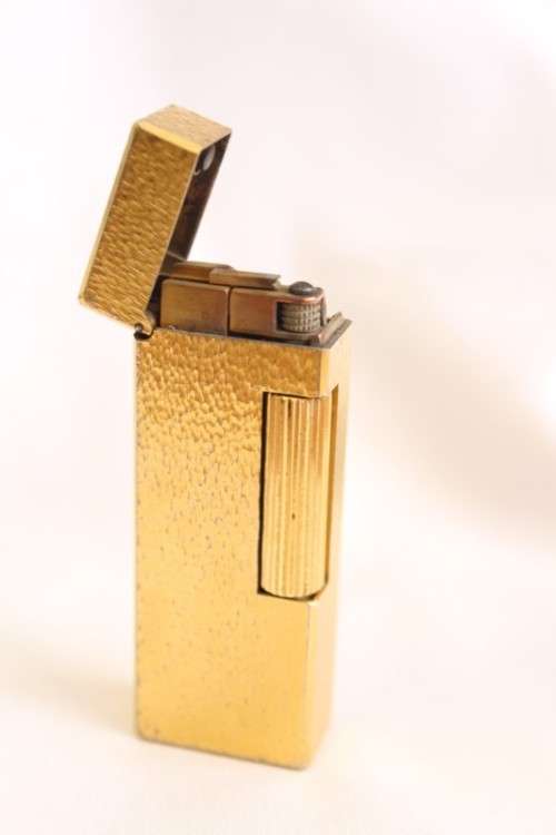 A stunning vintage (c1985) gold plated Dunhill Rollagas lighter in its box in working condition