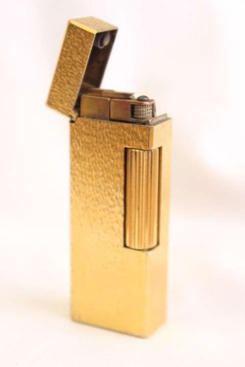 A stunning vintage (c1985) gold plated Dunhill Rollagas lighter in its box in working condition