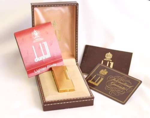 A beautiful vintage (c1972) gold plated Dunhill Rollagas lighter in its box in working condition