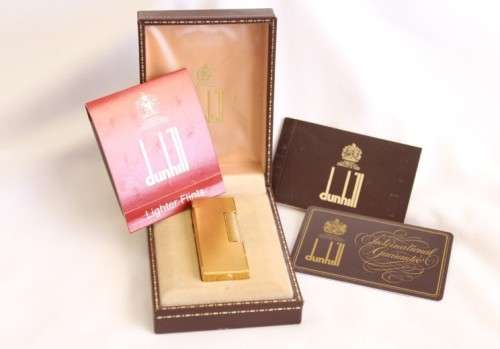 A beautiful vintage (c1972) gold plated Dunhill Rollagas lighter in its box in working condition