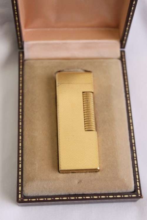 A beautiful vintage (c1972) gold plated Dunhill Rollagas lighter in its box in working condition