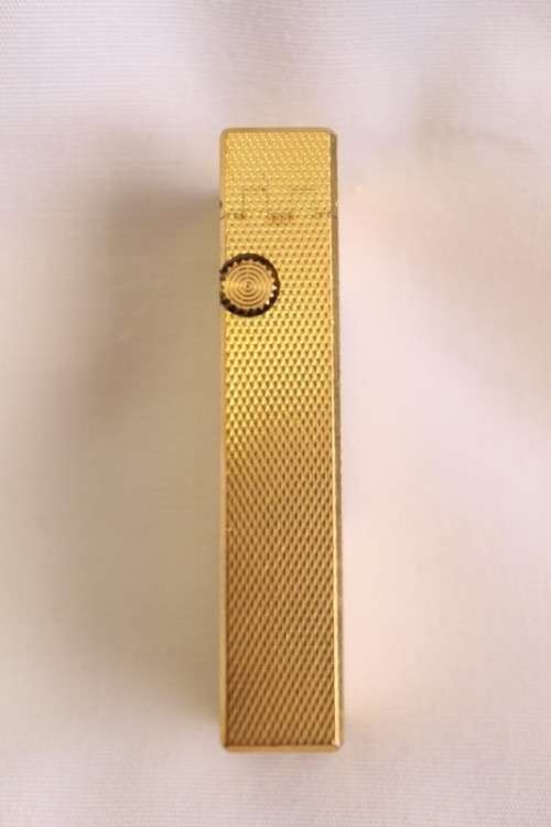 A beautiful vintage (c1972) gold plated Dunhill Rollagas lighter in its box in working condition