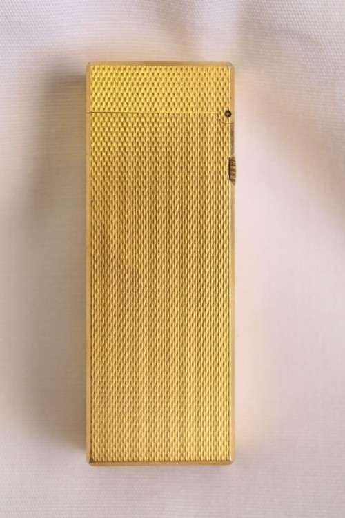 A beautiful vintage (c1972) gold plated Dunhill Rollagas lighter in its box in working condition
