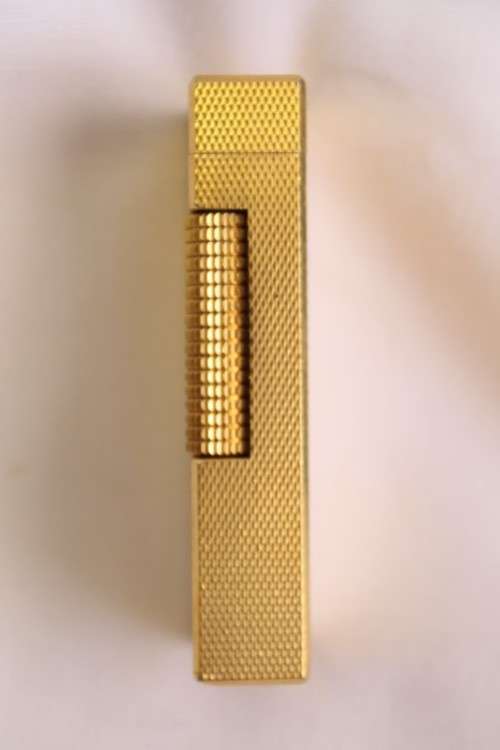 A beautiful vintage (c1972) gold plated Dunhill Rollagas lighter in its box in working condition