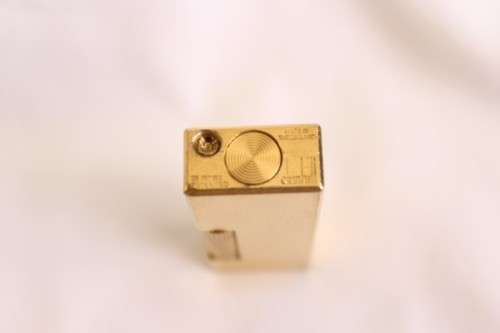 A beautiful vintage (c1972) gold plated Dunhill Rollagas lighter in its box in working condition