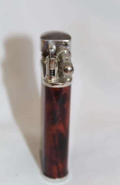 A stylish original (brown marble) Peterson pipe lighter in its original box in stunning condition
