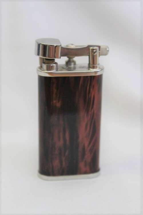 A stylish original (brown marble) Peterson pipe lighter in its original box in stunning condition
