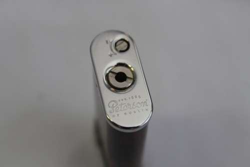 A stylish original (brown marble) Peterson pipe lighter in its original box in stunning condition