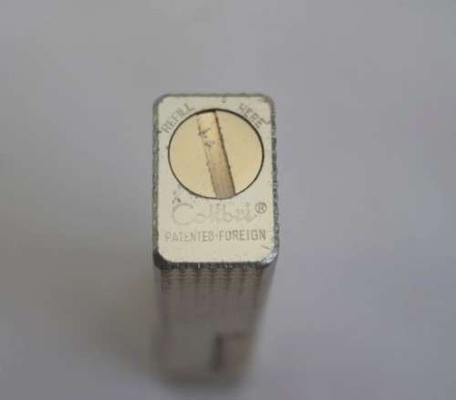 A stunning vintage (c1970's) silver plated (silvertone) textured original Colibri of London lighter
