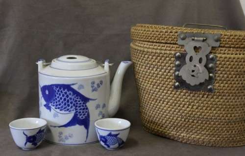 A gorgeous blue fish themed Antique Chinese tea set in padded rattan warming basket. Lifespace Sale