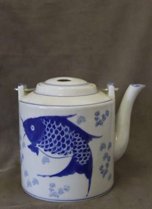 A gorgeous blue fish themed Antique Chinese tea set in padded rattan warming basket. Lifespace Sale