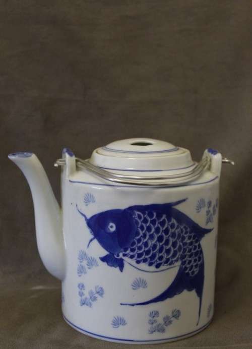 A gorgeous blue fish themed Antique Chinese tea set in padded rattan warming basket. Lifespace Sale