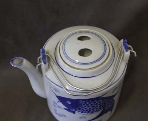 A gorgeous blue fish themed Antique Chinese tea set in padded rattan warming basket. Lifespace Sale