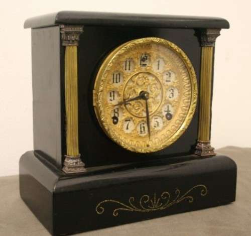 A beautiful, stylish vintage black wood "Sessions" wind up pendulum mantle clock. Working.